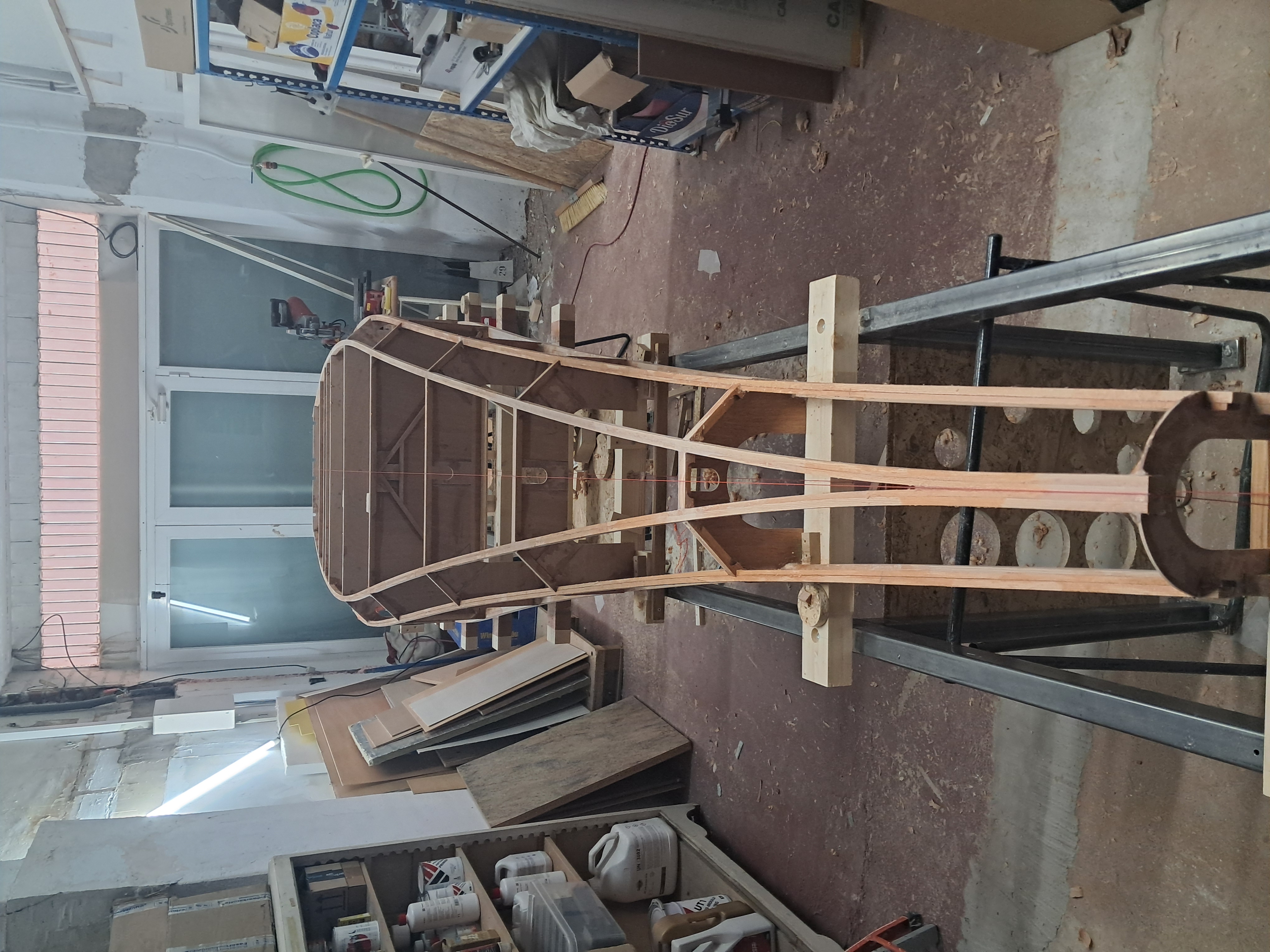 Overall view of the fuselage framework on the assembly jig after removing the clamps.