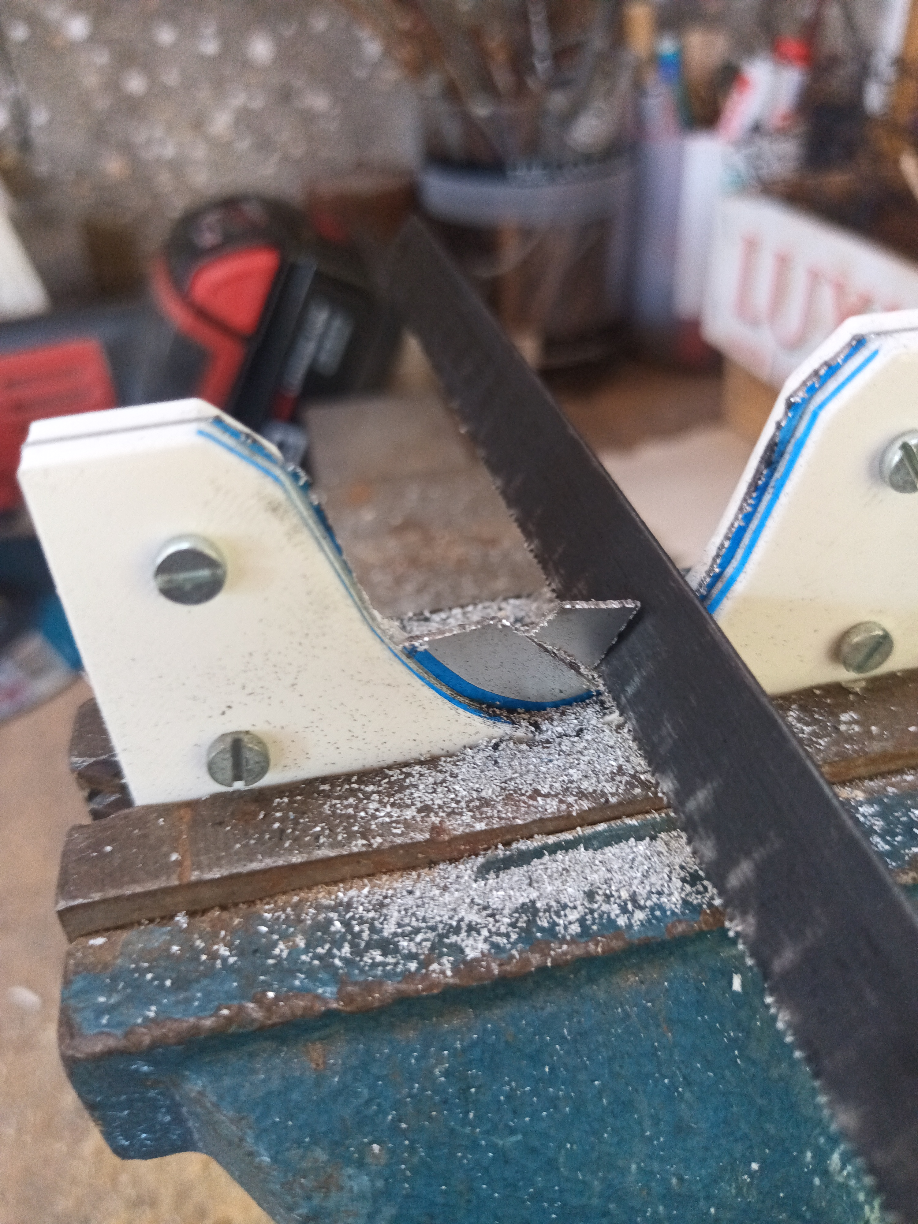 Cutting the aluminium template.