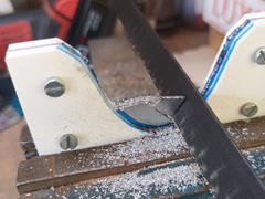 Cutting the aluminium template.